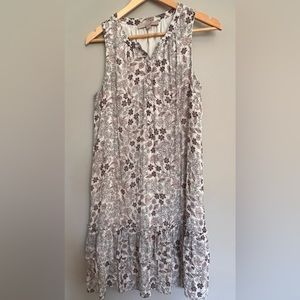 Loft sleeveless dress. White with pink blue and black floral pattern. Size M